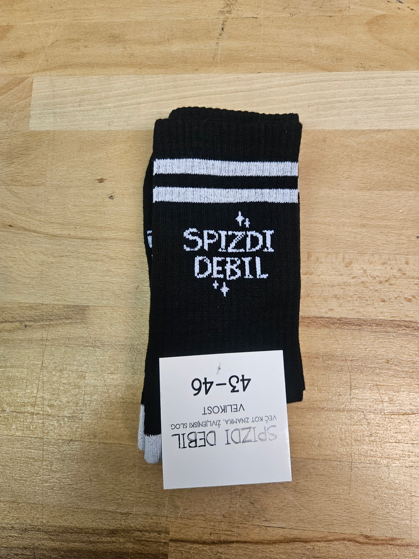 nogavice "male zmage veliki porazi" - črne z belim napisom